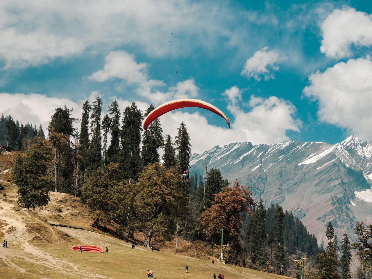A raft dropping into a rapid on the Beas