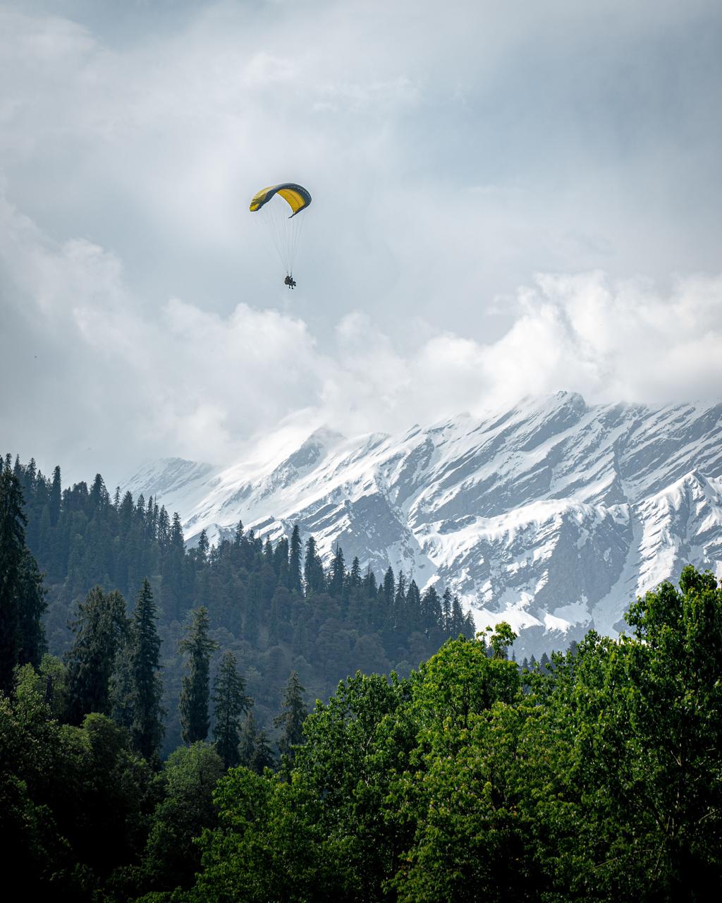 A raft dropping into a rapid on the Beas