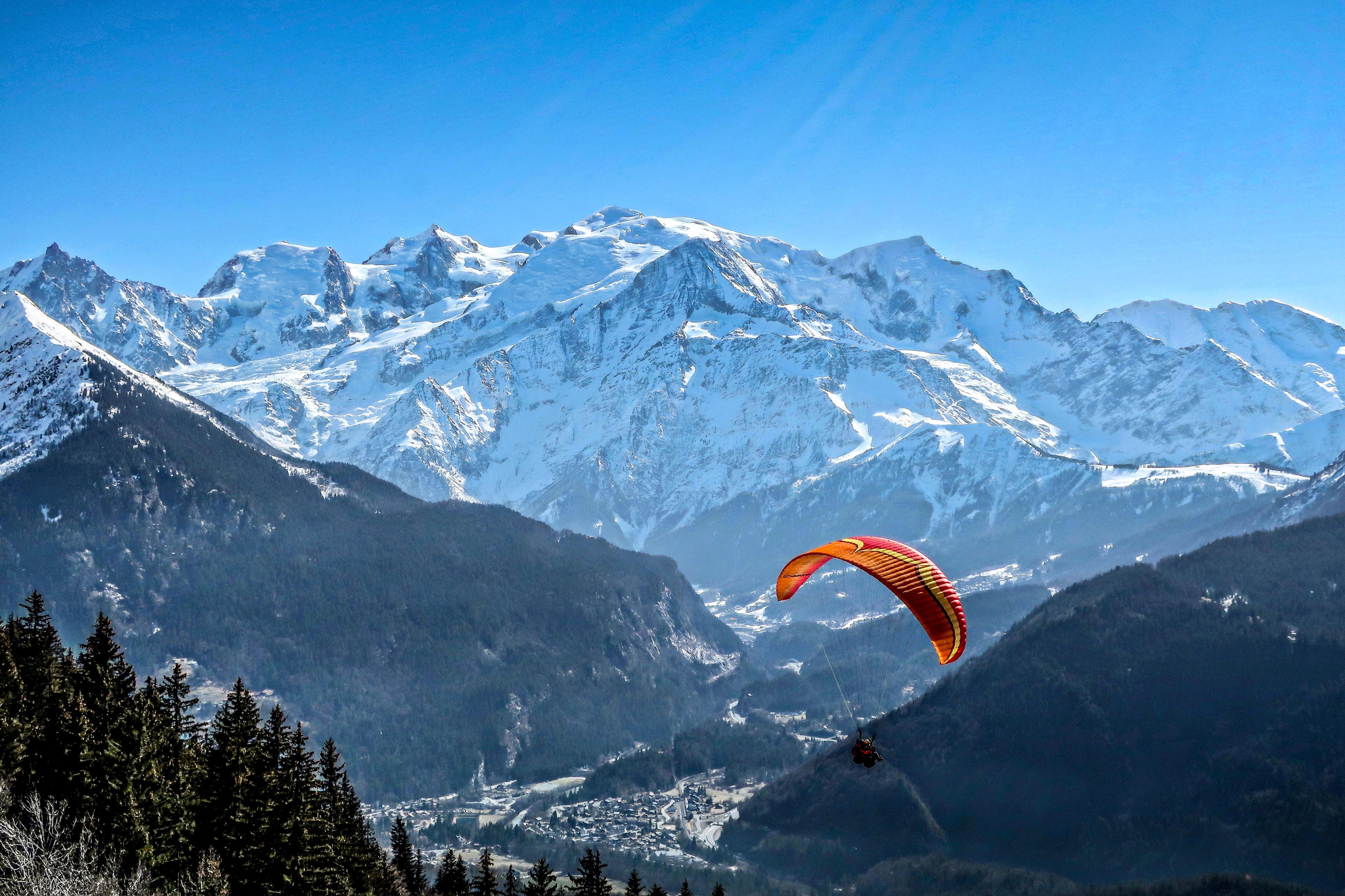 Three wings circling in a thermal above the Manali valley