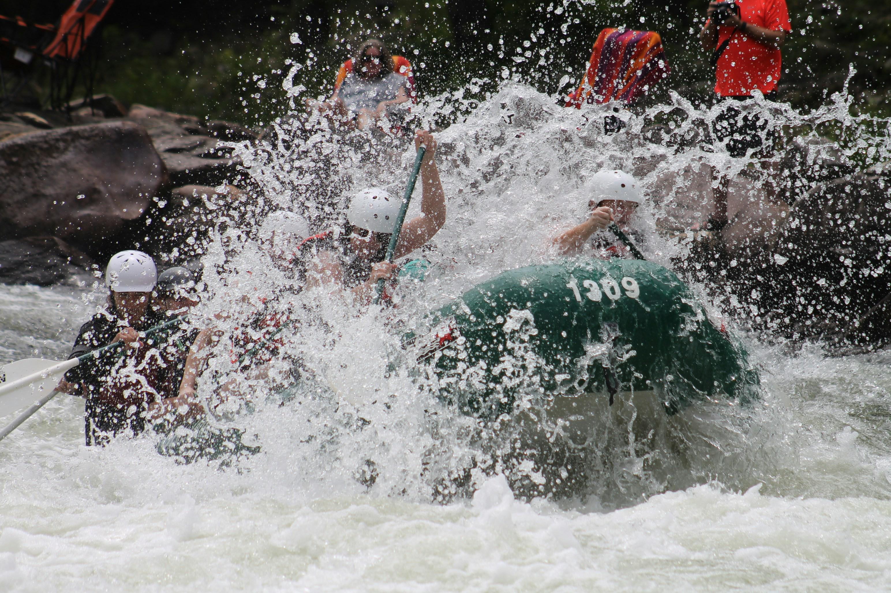 A raft dropping into a rapid on the Beas